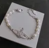 Braccialetti con ciondoli Designer Lettera Vivian Girocolli Lusso Donna Gioielli di moda Bracciale in metallo con perle cjeweler Westwood Motion attuale 990ess121