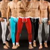 Sexiga Johns Men's Legging Pants Bulge Pouch Long Underpants Man Thermal Underwear Håll varma andningsbara byxor Sleepwear