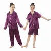 Пижамы 2шт. Пижамы для маленьких мальчиков и девочек. Детские шелковые атласные верхние брюки с длинными рукавами. Твердые пижамы на пуговицах. Атласный комплект. Ночная рубашка. Детская одежда для сна 231122.