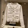 Kvinnors tröja lyxig lös stickad designer rockar mujer casual jacquard kontrast v-halkknapp långärmare jacka