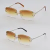 Designer Diamond Cut Lens Solglasögon Kvinnor Mans C Decoration Wire Frame Gelglas för kvinnor Rimless Men Luxury Glasögon utomhus 00920 Ny färgsköldslinsstorlek 60