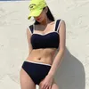 Designer bikini's vrouw tweedelige bikini nieuwe Koreaanse versie bikini witte rand versiering minimalistische split Womens badpak badpakken