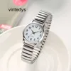 Luxury Watch Watch äldre koreansk version Par stort antal enkla män och kvinnors legering Elastic Band Quartz