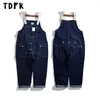 Mäns jeans Multi-Pocket Denim Overalls Mens Safari Style Casual Loose Cargo Pants Jumpsuit Men Dungarees