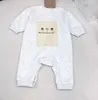 Nieuwe peuter jumpsuits Borstzak decoratie pasgeboren babykleertjes Maat 66-90 Terug logo print baby Gebreide bodysuit Nov25