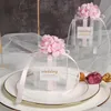 Scatola di caramelle trasparente 6x6x6 cm con nastro di fiori artificiali Souvenir di nozze per gli ospiti Scatola di cioccolatini opachi per confetti per il battesimo