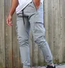 Nowe męskie spodnie mody multi kieszeni ładunek uliczny Hip Hop Elastyczne talia haremowe skokowe spodnie