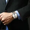 Stolze Vogel Herren neue mechanische Uhr vollautomatische Hohlbohrplatte Kalender leuchtende Stahlgürtel Perspektive hintere Abdeckung