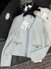 Designer giacche da donna 2023 Inizio autunno Nuova moda femminile Cappotto corto con scollo a V dolce, delicato, sottile e di età ridotta J0I5