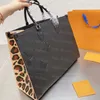 10A Bolsos de diseñador de moda Bolsos de mujer Bolsos con monogramas de flores en relieve Bolso de mano para mujer Bolso de mano para mujer Bolso de hombro de cuero Mochila femenina Asa Bolso de compras para mujer