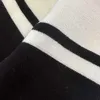 Luxo outono bebê fatos de treino crianças roupas de grife tamanho 100-150 contraste preto e branco camisola de malha calças de alta qualidade nov25