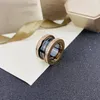 Anello da amore a vite di design Coppia da donna per uomo Ceramica nera 1-3 giri Gioielli in oro 18 carati 925 di alta qualità con scatola misura 5-11 Anelli a fascia di lusso in argento rosa per donna uomo