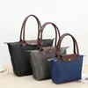 Opbergtassen Klassiek Trendy dameshandtas Nylon Waterdichte Oxford-tas Opvouwbare knoedel Grote capaciteit Winkelen Meisjesgeschenken