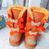 Clássico quente designer botas femininas longo cano de perfuração diamante boota pele cheia fofo peludo cetim bailey arco tornozelo botas