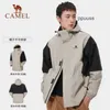 Designer Camel Arcterys Giacche Abbigliamento Cappotti Antivento e impermeabile serie panda prova tuta d'assalto cappotto singolo impermeabile esterno Xizang turismo alpinista