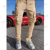 Jeans da uomo Pantaloni multitasche riflettenti stile esplosivo elastici di grandi dimensioni tuta sportiva casual pantaloni dritti di marca alla moda da uomo T231123