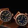 Orologi meccanici di fascia alta in pelle da uomo con movimento automatico luminoso in bronzo del produttore su misura