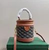 Schoonheidsbehuizing omgekeerd Gy lederen petite size crossbody verwijderbare riem trommel schouder een handvat cilinder mini -tas