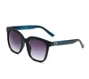 Diseñador de lujo Gafas de sol Hombres Anteojos Tonos al aire libre Marco de PC Moda Classic Lady Gafas de sol Espejos para mujeres G0034