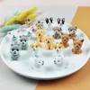 Encantos apeur 10 unidades/pacote 3d adorável animal cão resina caber diy jóias fazendo acessórios filhote de cachorro chaveiro pingente