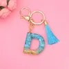 Colgante de llavero Simple de 26 letras con borla azul para niñas, adorno colgante para bolso, iniciales de A-Z, accesorios para llaves de resina