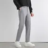 Pantaloni da uomo Primavera Estate Abito da uomo Slim Lavoro Elastico in vita Pantaloni formali morbidi Maschile Corea Nero Grigio Marchio di abbigliamento Taglie forti 40 42