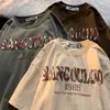 Camisetas masculinas verão letra americana impressão de mangas curtas Mães e mulheres Hip Hop Street Design solto casual casal meia manga Tops 230422