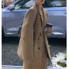 Fashionabla avancerade små klänningar 2023 Höst- och vinter Nya koreanska slitage Silhuett Woolen Blazer Tvådelad kostym