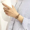 Montres-bracelets femmes à la mode blanche petite montre marque bracelet à quartz bracelet en cuir simple