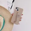 Designer Luxury Fashion Silicone Litchi Heart Chain Couleur unie Lettre Téléphone Case iPhone 15 14 14Pro 14Plus 13 12 Mini 11 Pro X XS Max XR Étui de téléphone de luxe