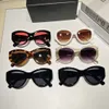 Óculos de sol de designer de luxo para homens e mulheres Modelo de moda especial UV 400 Proteção Double Beam Frame Outdoor Brand Design Alloy Top Cyclone Sunglasses 9228