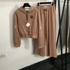 Tute da personalità femminile Pantaloni da cappotto con cappuccio alla moda Pantaloni da giacca in cardigan con cerniera in cotone morbido al tatto di lusso