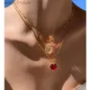 Pendant Necklaces Brass With 18K Gold Red Rhinestone Zircon Heart Floral Necklaces Women Jewelry Punk Party Designer Club T Show Korea JanL231122