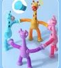 Suction cup giraffe ever-changing luminous cartoon telescopic children's baby educational parent-child interactive stretch tube decompression toy