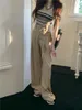 Женские брюки сбрасывают двойной карманный костюм для женщин 2023 Дизайн чувства уникального и стройного