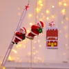 Suprimentos de brinquedos de Natal Enfeites de Natal Presente Escada de escalada elétrica Papai Noel Boneca Brinquedos com Música Feliz Natal Árvore Pendurada Decoração 231124