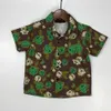 23SS Kid Sets Çocuklar Trailsuit Çocuk Tasarımcı Kıyafetleri Bebek Seti Erkekler Çiçek Baskı Kısa Kollu Gömlek Elastik Bel Şortları Takım Yüksek Kaliteli Bebek Giysileri