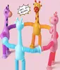 Suction cup giraffe ever-changing luminous cartoon telescopic children's baby educational parent-child interactive stretch tube decompression toy