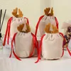 Confezioni regalo 20 pezzi Sacchetti di caramelle natalizie Imballaggio con cordino in velluto Navidad A