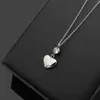 2023 클래식 브랜드 T 크리스탈 펜던트 여성 신제품 Charm Peach Heart Diamond Necklace 18K Gold Titanium Steel Designer Necklace Jewelry