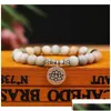 Bärspärrad pärlor 8mm matt amazonite stensträngarmband yoga chakra mala om lotus kvinnor män charm handgjorda smycken tqg8g droppleverans dhqk4