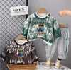 Clothing Sets Baby boy autumn clothing set designer children's cartoon bear tie dye long sleeved shirt pants children's sportswear baby clothing 231124