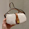 Toppdesigner axelväska modehandväskor kvinnor totes väskor mini pochette mode plånböcker lady handväska hårdvarelås handväska mode vintage 2 färger purses parti