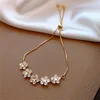 Charm Bracelets Elegant Intarsien Koreanische Goldfarben-Blumen-Armband für Frauen Modeschmuck Accessoires Party-Geschenke 230424