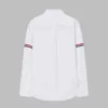 Luxury designer's new men's and women's short sleeved sportswear set Oxford Textile Casual Long Sleeve Double Shoulder Color Ribbon White Shirt Unisex