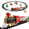 Julleksak leveranser Jultåg Set Electric Train Toy With Sound Light Railway Tracks For Kids Gift Christmas Tree Decorations Steam Train 231124