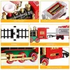 Julleksak leveranser Jultåg Set Electric Train Toy With Sound Light Railway Tracks For Kids Gift Christmas Tree Decorations Steam Train 231124