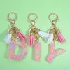 Moda 26 Cadeia -chave do alfabeto inicial Green Butterfly Tassel Key Ring Star Love Keychain Mulheres Bolsa Pingente Chave