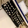 Chokers Designer Pendant Halsband Pearl Long-Chain Halsband Kvinnor CCITY SMEEXKE KVINNA Hösten och vintertröja kedja 5673