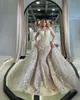 Splendidi abiti da sposa a sirena con gonne oversize Perle Appliques Abito da sposa in pizzo Colletto alto Illusion Maniche lunghe Abiti da sposa di lusso